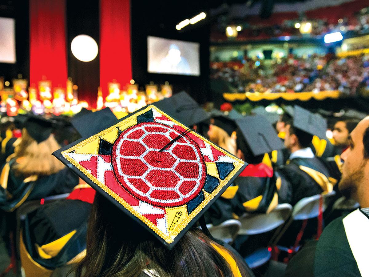 Turtle shell and Maryland flag design on grad cap