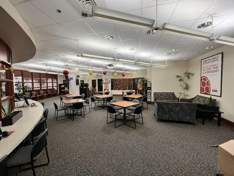 Several square tables with chairs