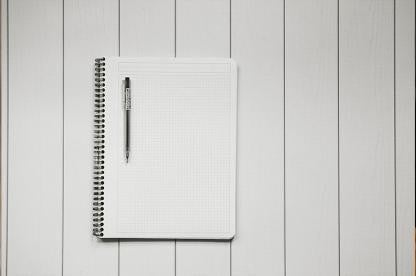 Blank notepad and pen